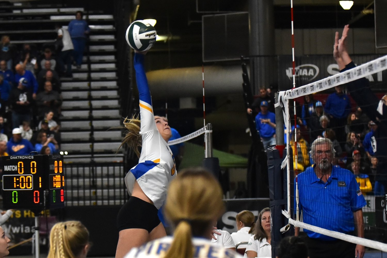 Danika Hallom sends out a spike during No. 5 Adna's three-set win over No. 12 Tri-Cities Prep in the first round of the 2B state volleyball tournament on Nov. 10, at the Yakima Valley SunDome.